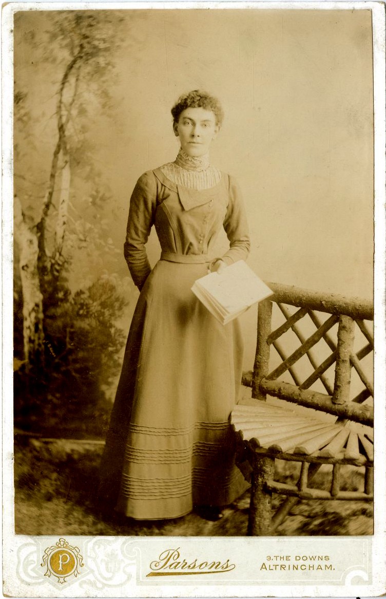 Woman by rustic seat by William Augustus Parsons